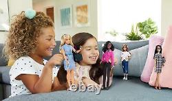 Barbie Race of The Year Doll. Incluye 4 Barbie Dolls Of 12 Inches