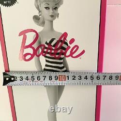 Poupée Barbie Mattel en édition limitée pour le 75e anniversaire avec maillot de bain doré signature